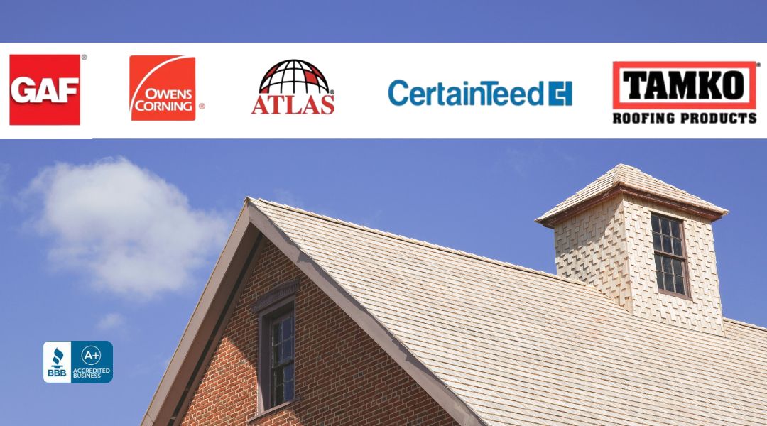 brick home recently remodeled with new cedar shingle roofing